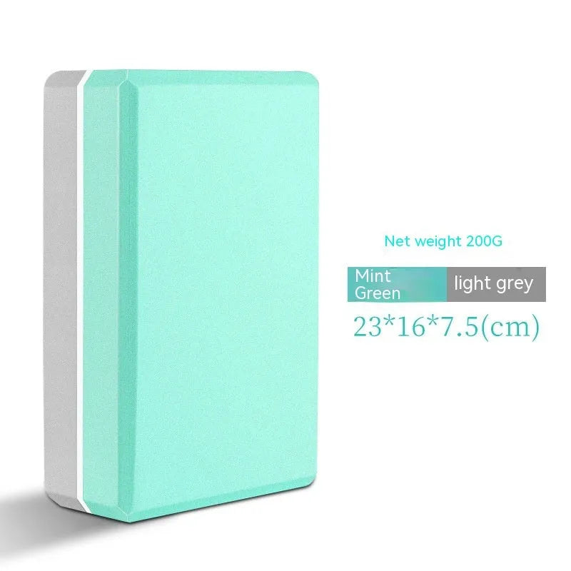 EVA foam yoga block in violet colour, shown next to a pink block, demonstrating its size and rectangular shape for fitness support.