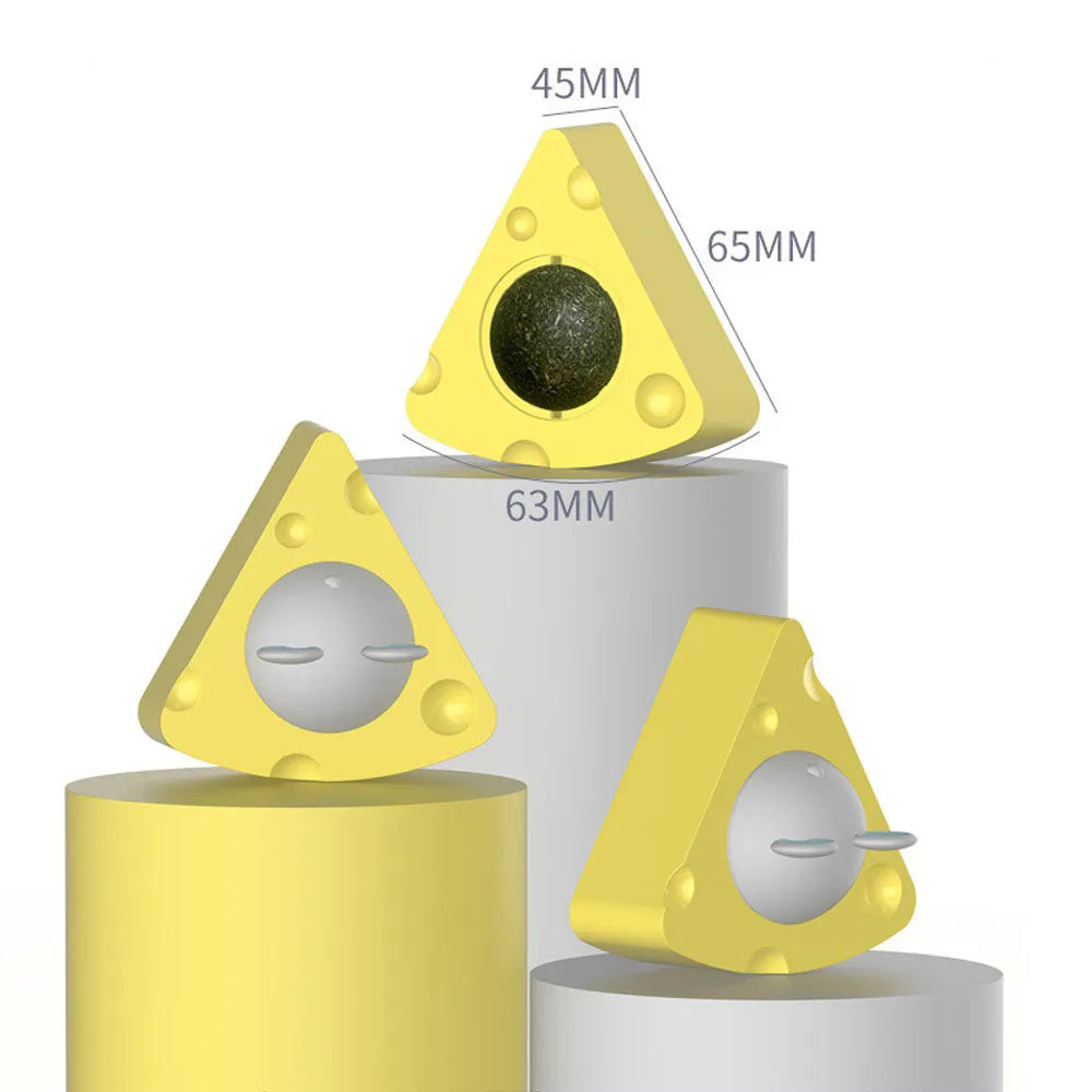 Yellow catnip toy ball with silvervine and a natural cheese flavour, includes a cat stick and wall treat holder.