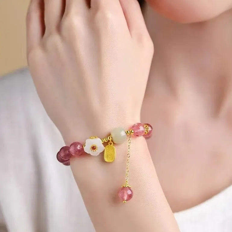 Handmade strawberry quartz crystal bracelet with green quartz moon charm for women