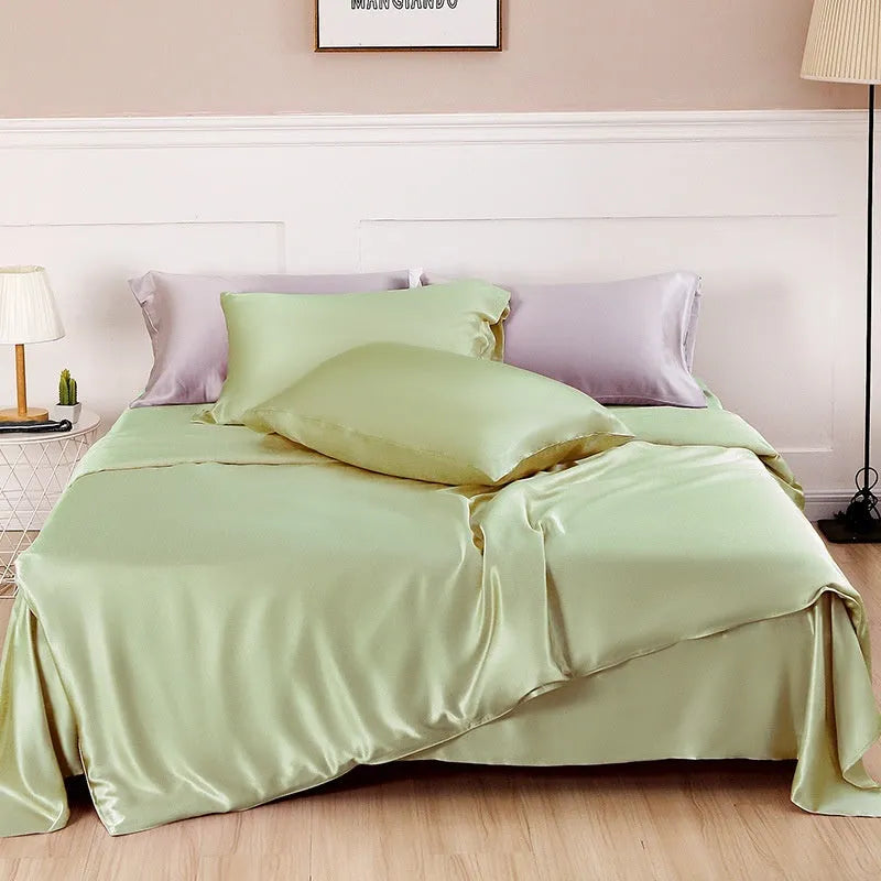 Double-sided solid colour silk duvet cover in bright brown laid flat on a bed.