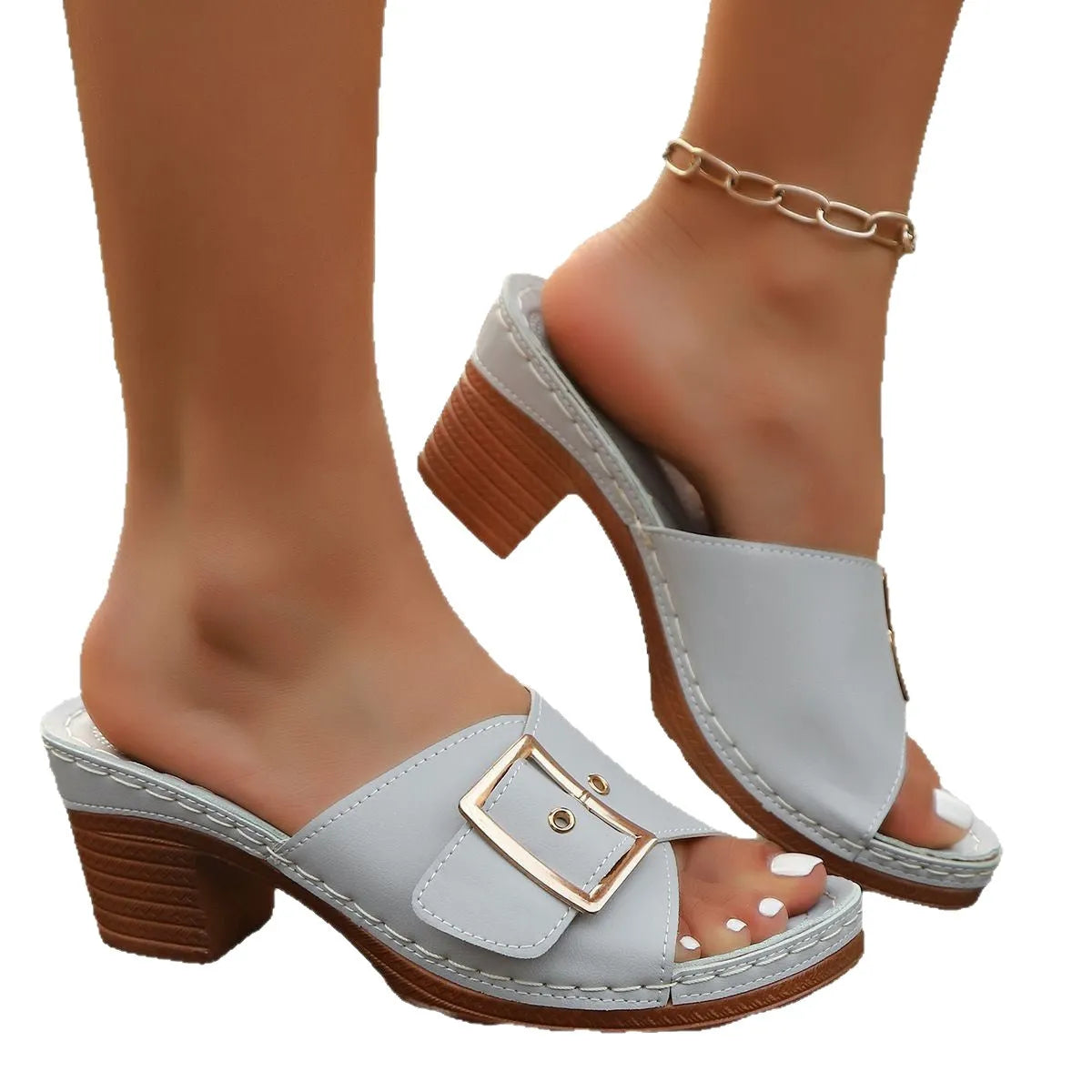 Women's black and light blue chunky heel slippers with a metal buckle closure on a rubber sole.