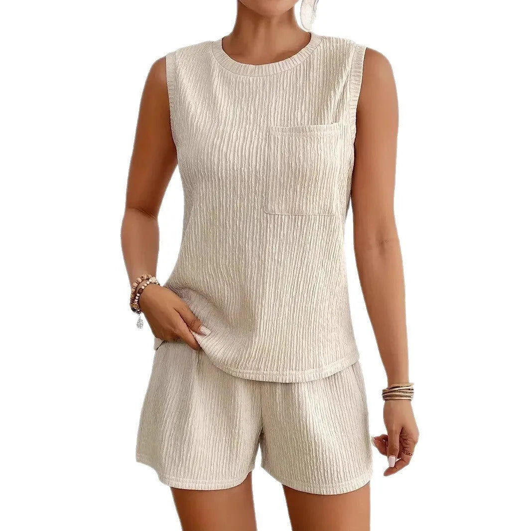 Apricot and orange sleeveless round neck vest with matching shorts set on hanger