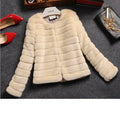 Women's short sleeve faux fur top in beige colour, street fashion style.