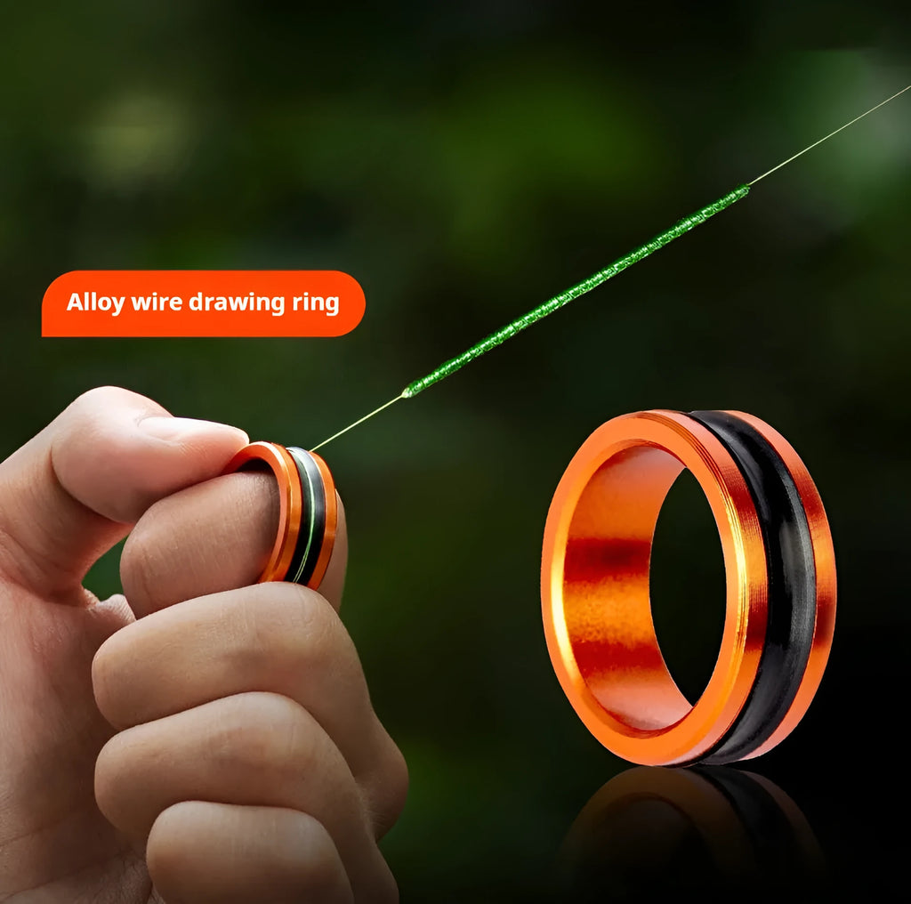 Orange and silver alloy fishing hand guard tool with pull ring for non-slip grip