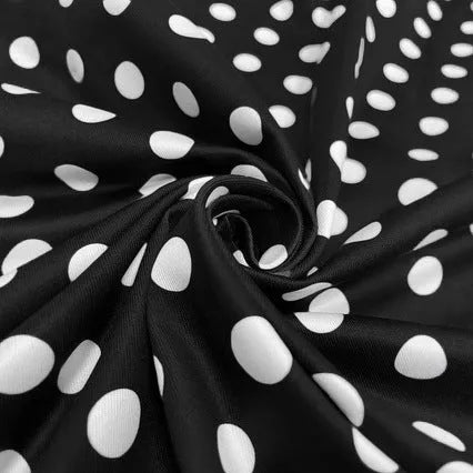 Women's multicolor polka dot dress with square collar, short sleeves, front zipper, and pleated mid-length skirt.