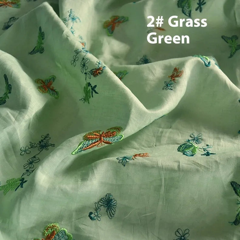 Pure ramie embroidery cloth hanfu fabric in beige, dark green, or grass green, showing texture.