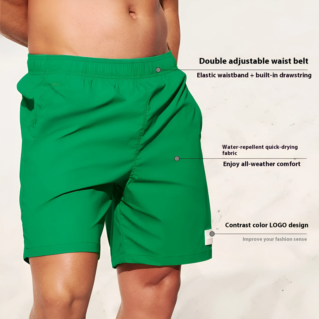 Men's nylon sports shorts in solid colours with straight leg opening and elastic waistband