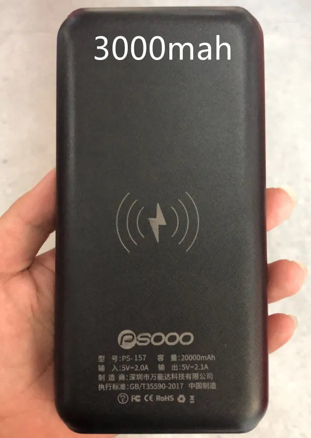 Solar power bank with wireless charging surface, three USB ports, and LED flashlight in black colour