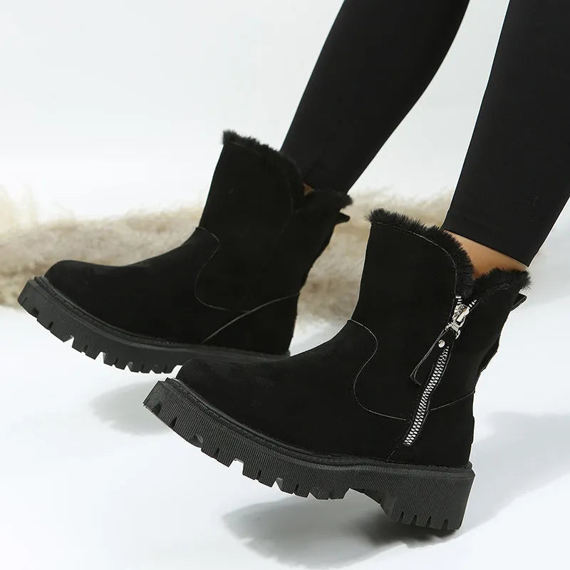 Women's black high-top snow boots with side zipper and round toe, made from cow suede.