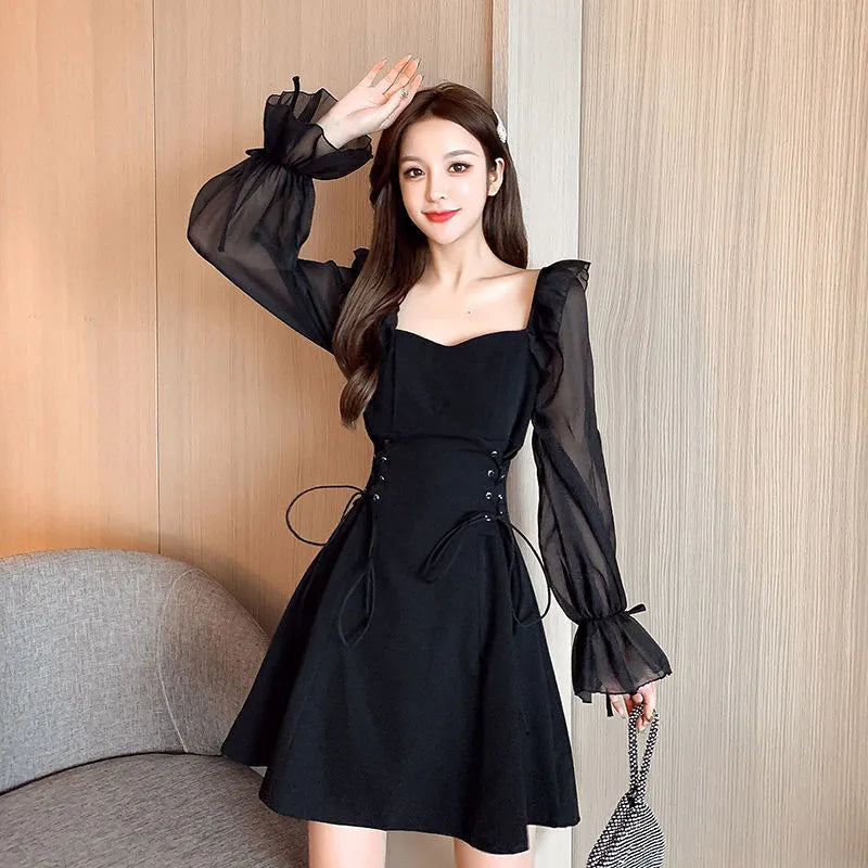 White chiffon patchwork waist-slimming maxi dress with long sleeves on mannequin