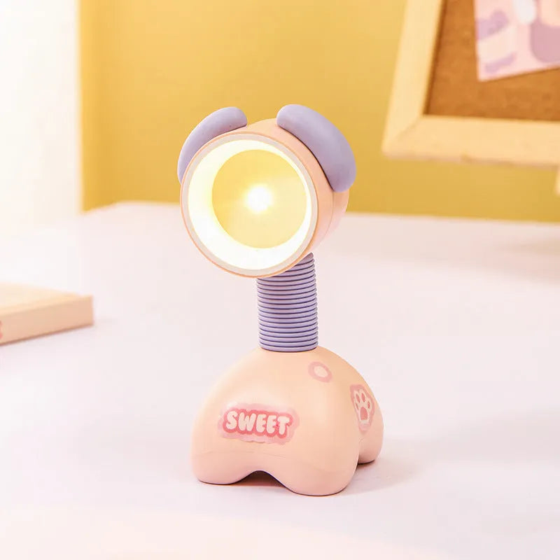 DIY magnetic cartoon small night lamp with multi-angle adjustable lighting on desktop