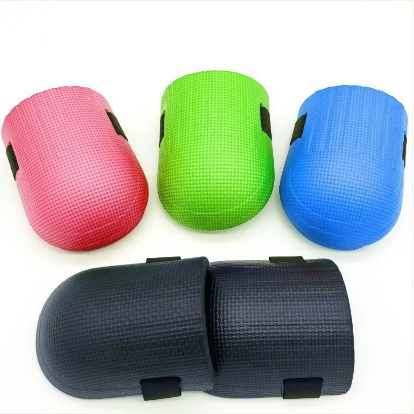 Pair of thick foam kneepads in various colours for construction and auto repair work.