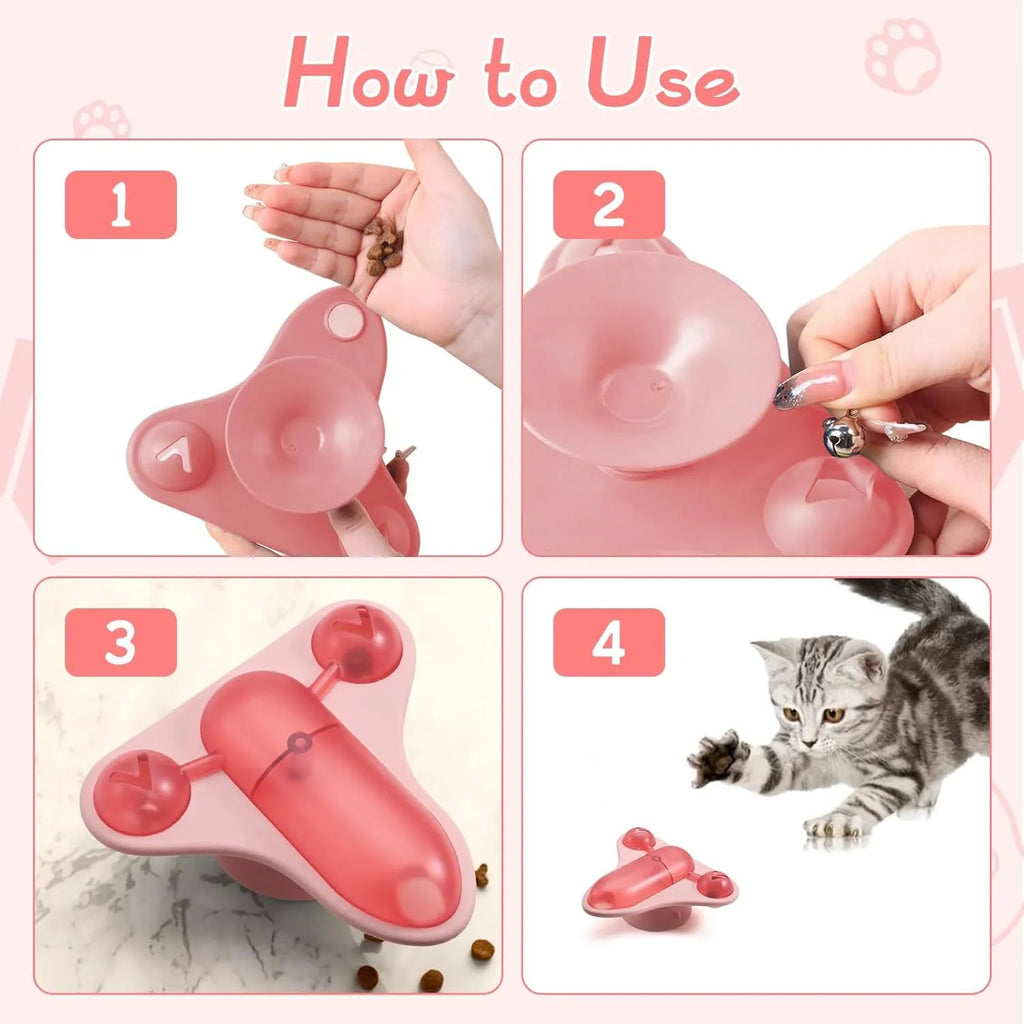 Blue interactive pet puzzle toy with snack cabin, bell, and catnip on a smooth floor.