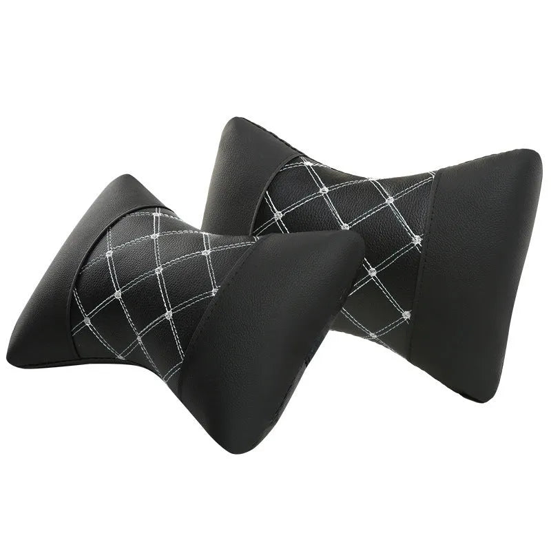 Black quilted artificial leather car headrest pillow with coloured diamond stitching for neck support.