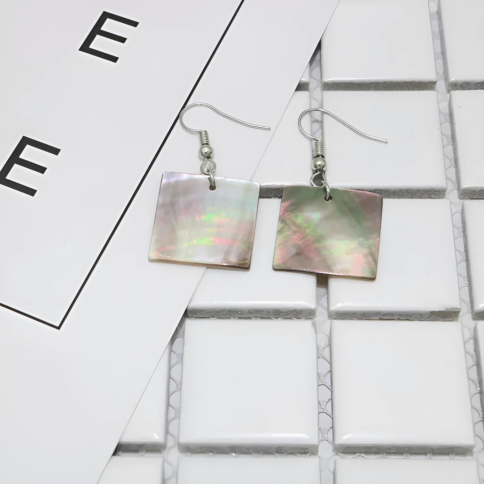 Geometric shell earrings in rectangular and square designs with natural retro style