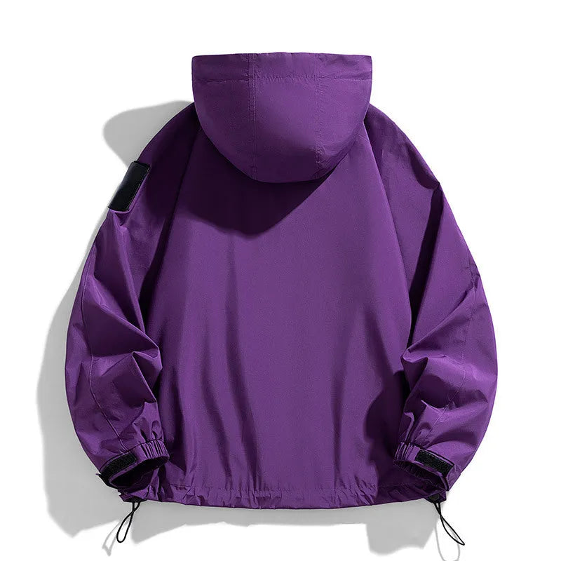 Men's black hooded windproof waterproof jacket shown on a model, with size chart showing options from M to 8XL.