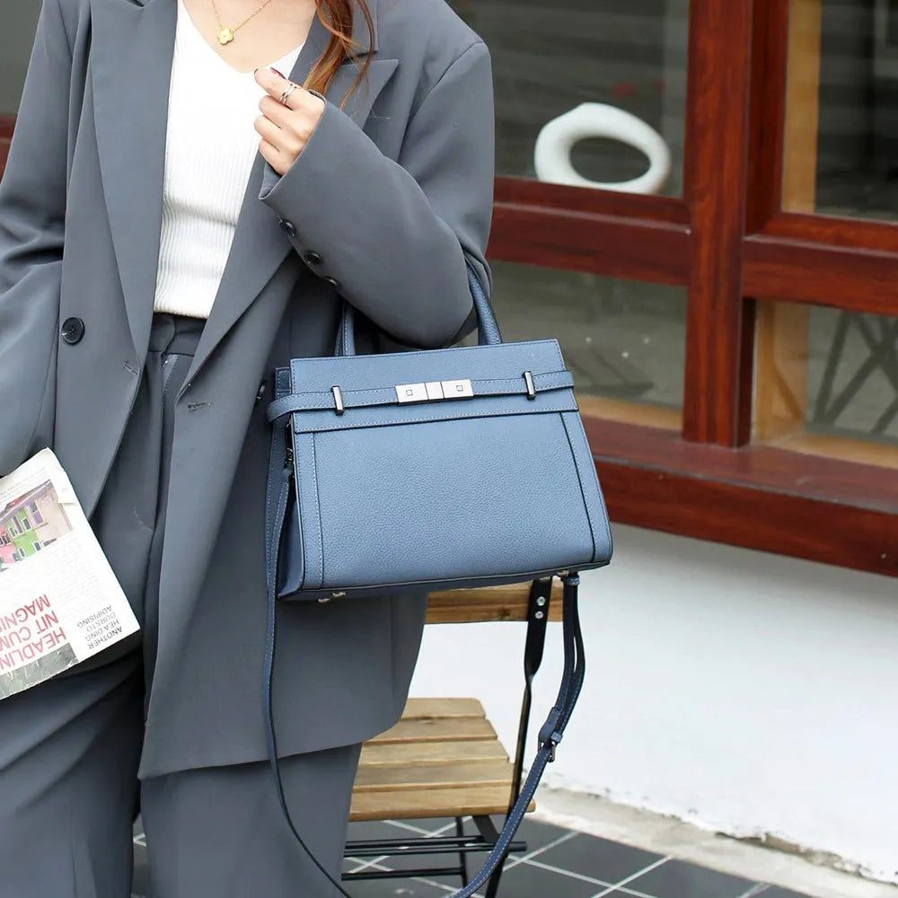 Small square genuine leather shoulder bag with zip compartments in almond green colour