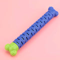 Blue and green silicone dog molar tooth cleaner toy with textured brush head and nodules.