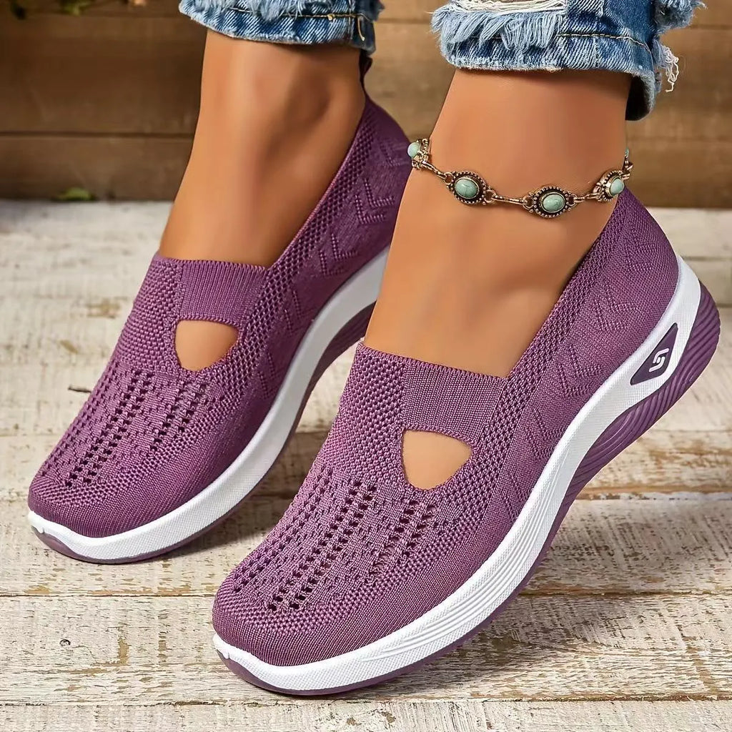 Casual mesh walking shoes with T-strap in multiple colours on a soft PVC sole.