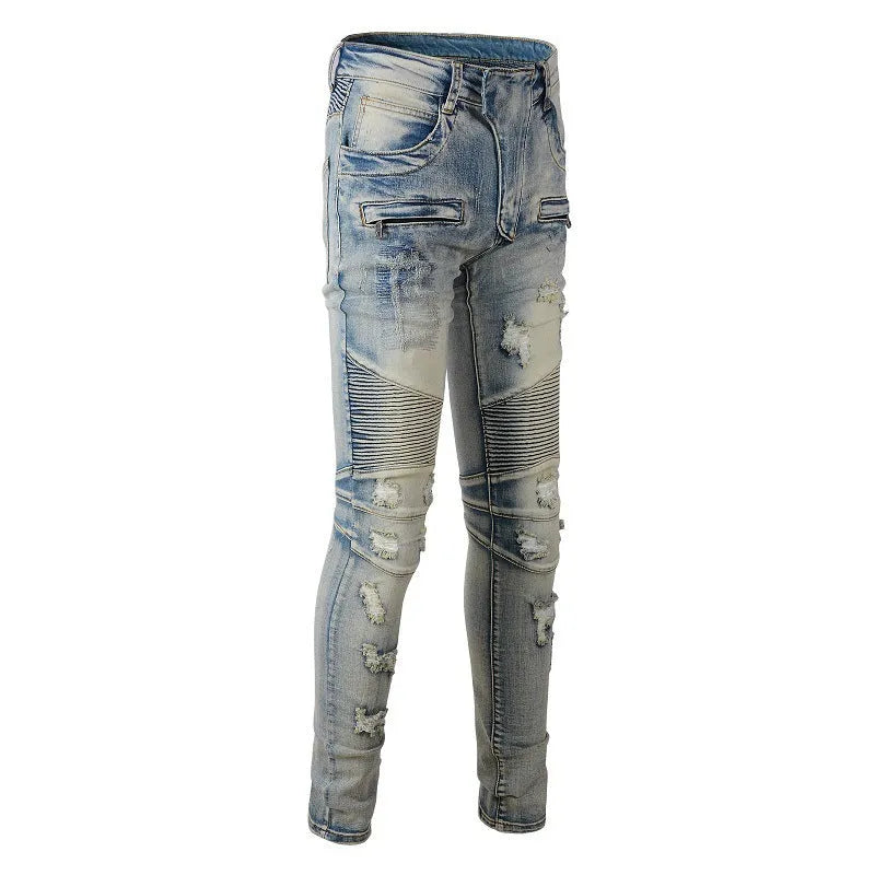 Men's light blue slim fit distressed stretch jeans with hand-frayed detailing on a mid waist with zipper fly.