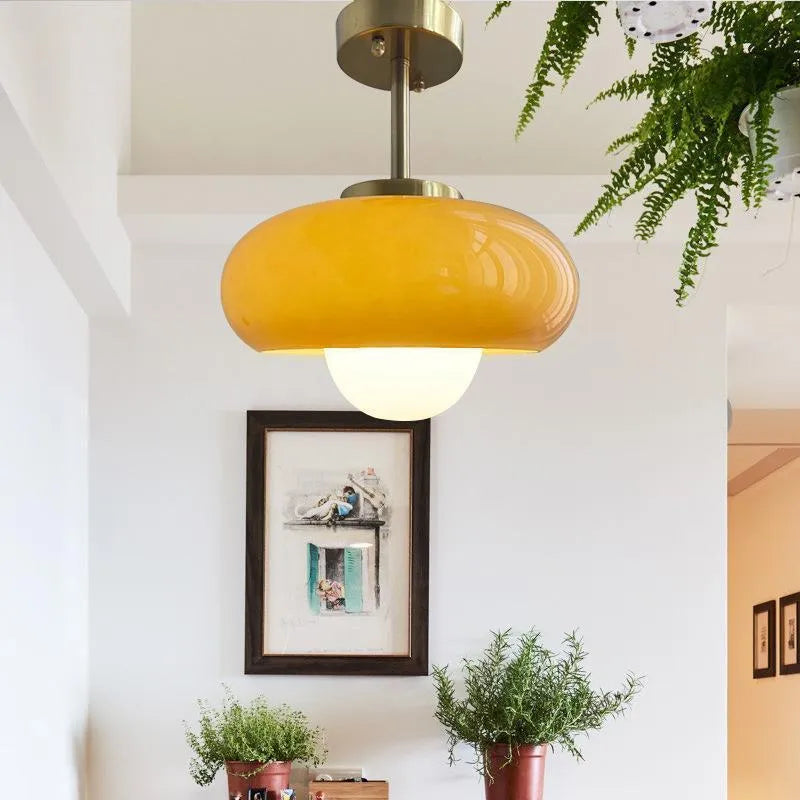 Bauhaus retro style glass pendant ceiling light with three egg tart shaped shades in milk white finish.