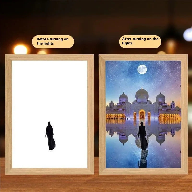 Modern rectangular LED light painting frame showing a sea and home scene on a wall.