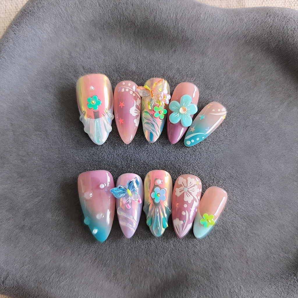 Handmade small flower and butterfly nail art sculptures for three-dimensional manicures