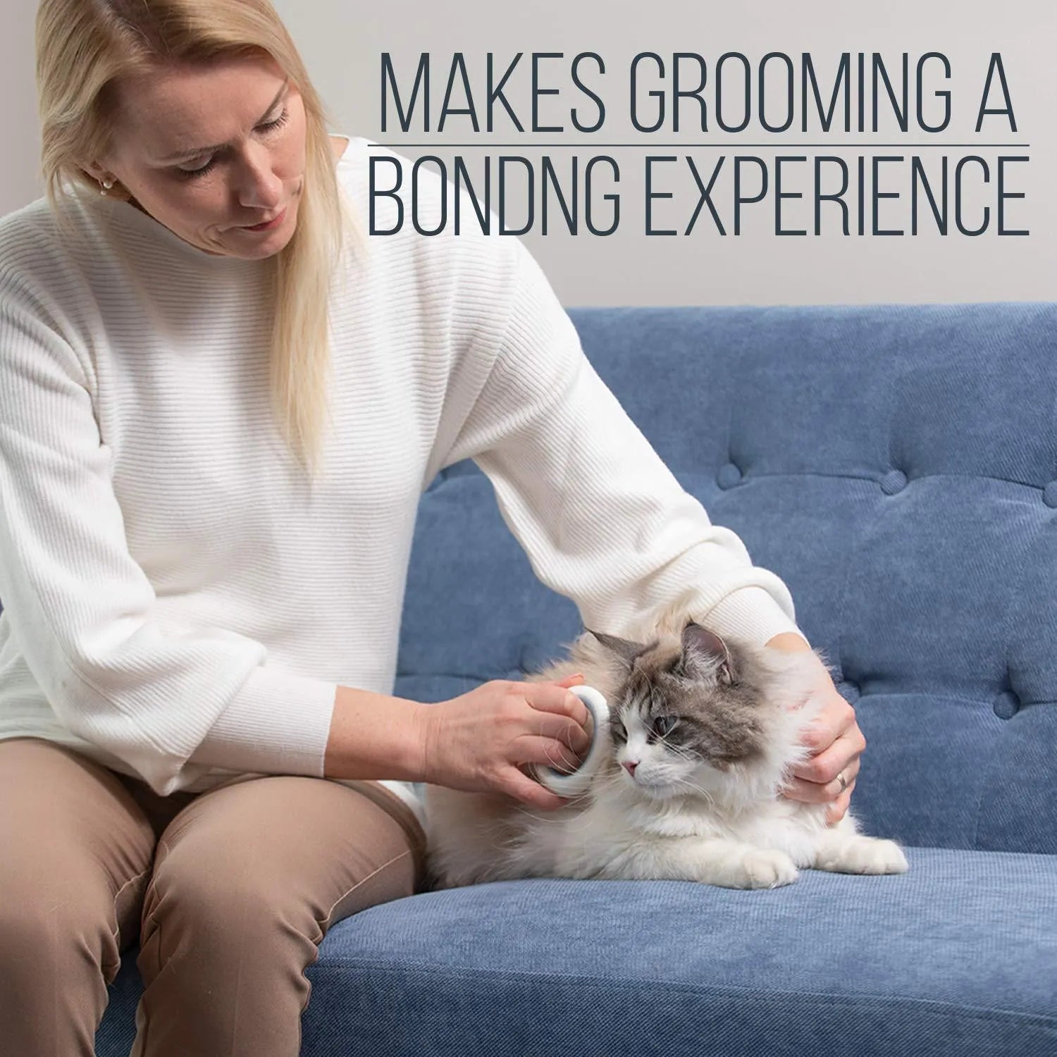 Blue pet grooming comb for deshedding and dematting cat and dog fur with ergonomic handle