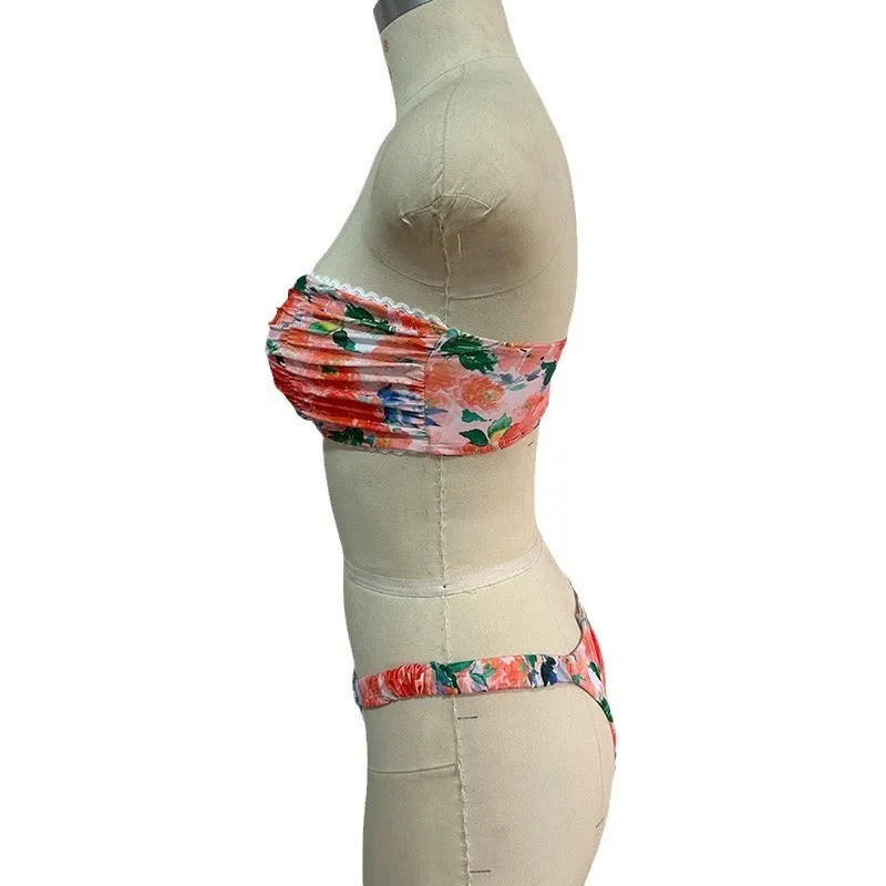 Women's floral print lace detail tube top bikini with matching shorts in blue, yellow, pink, or multi-colour.