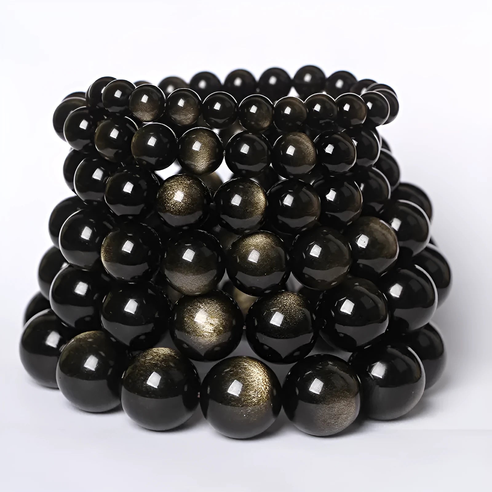 Hand-woven obsidian couples bracelet with year of birth engraving and multiple bead diameter options