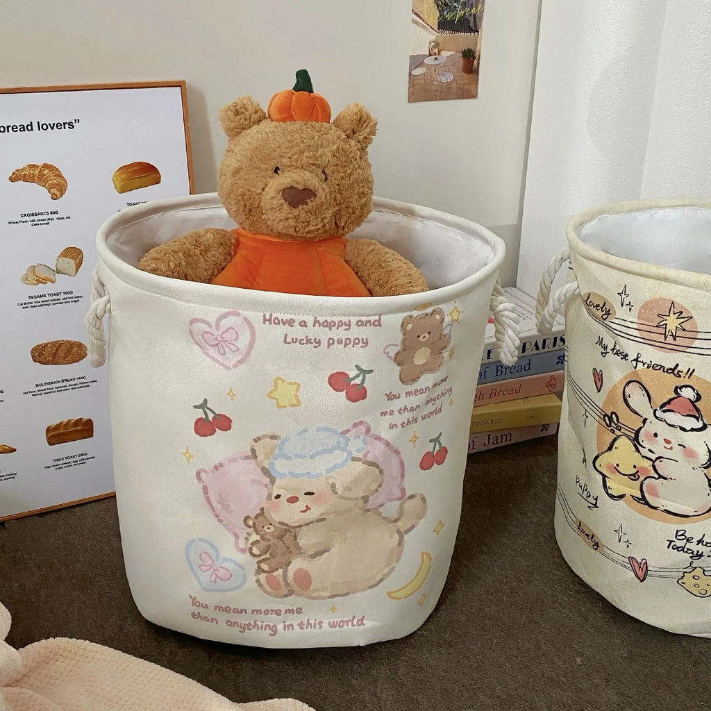 Foldable cotton cloth laundry basket in a character print colour, shown unfolded for use.