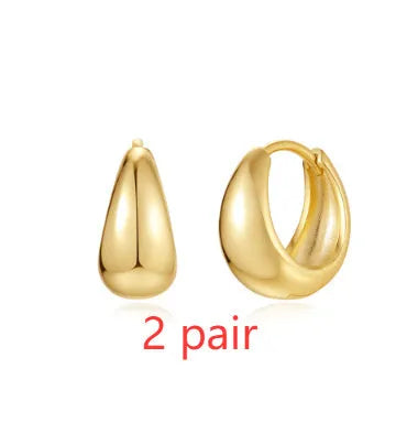 Brass diamond earclip earrings with geometric shape and gold electroplated finish