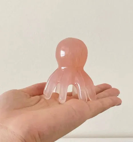 Pink natural resin octopus massage comb for facial and periocular meridian massage