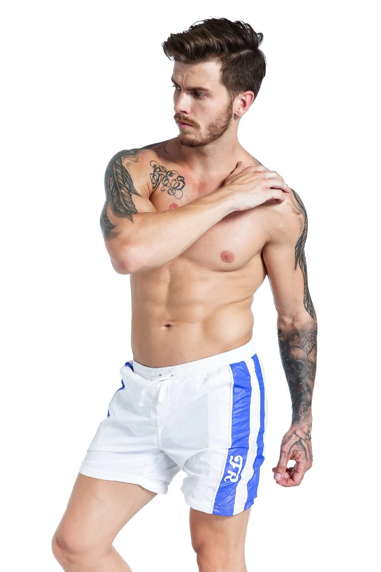 Men's blue lace-up sports shorts with slim fit and removable padding on athletic background