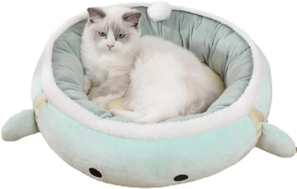 Green chick-shaped cat bed shown both flat and hanging as a hammock, suitable for small pets.