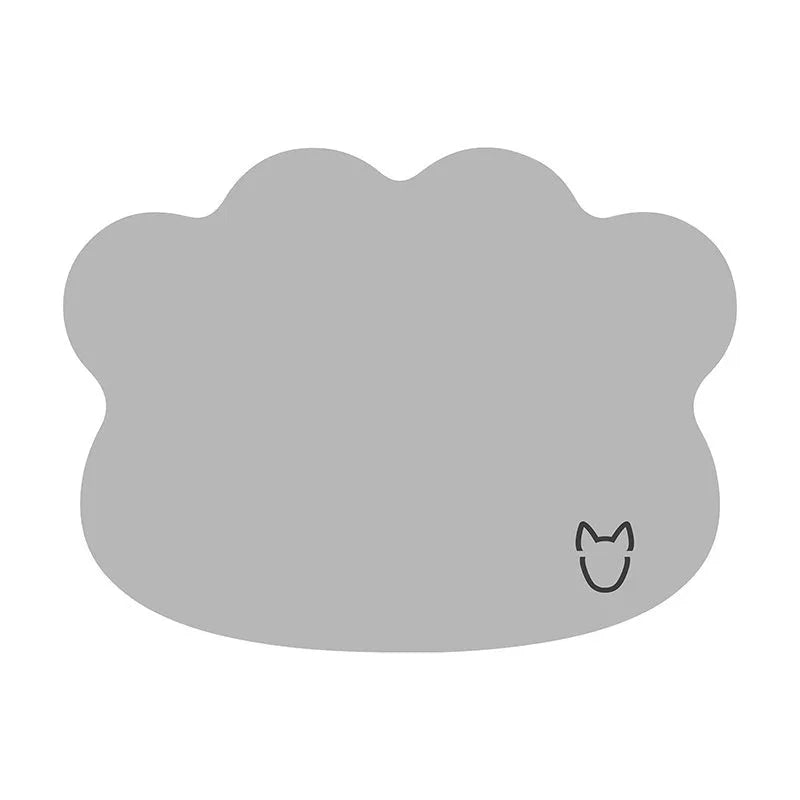 Ice silk dog cooling mat with simple dog head shape print, shown in a light grey colour on a wooden floor.