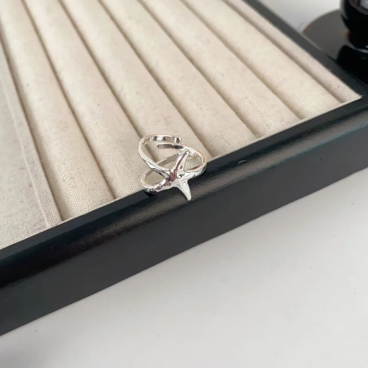 3D Jasmine flower ring with open mouth design in electroplated zinc alloy.