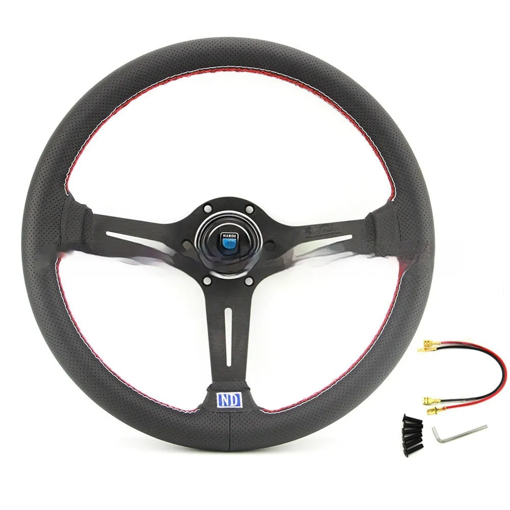 14-inch silver black leather steering wheel with concave centre grip and skeleton frame visible