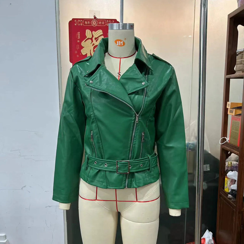 Black punk style leather jacket with a Peter Pan collar and regular sleeves on a hanger.