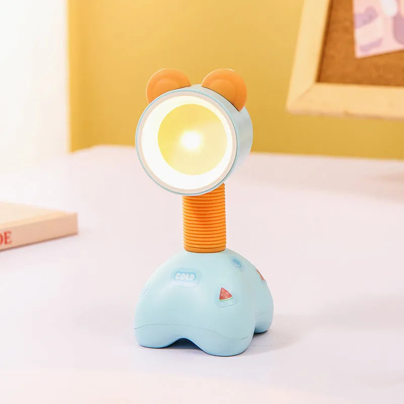 DIY magnetic cartoon small night lamp with multi-angle adjustable lighting on desktop