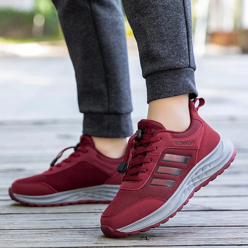 Casual breathable mesh slip-on shoes for men and women with elastic band and non-slip sole.