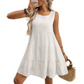 Women's loose sleeveless plaid dress with an oversized swing skirt and high waist.