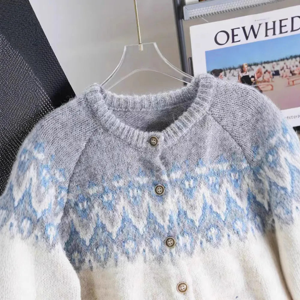 Women's loose-fit jacquard knit sweater coat in beige, shown with long sleeves.