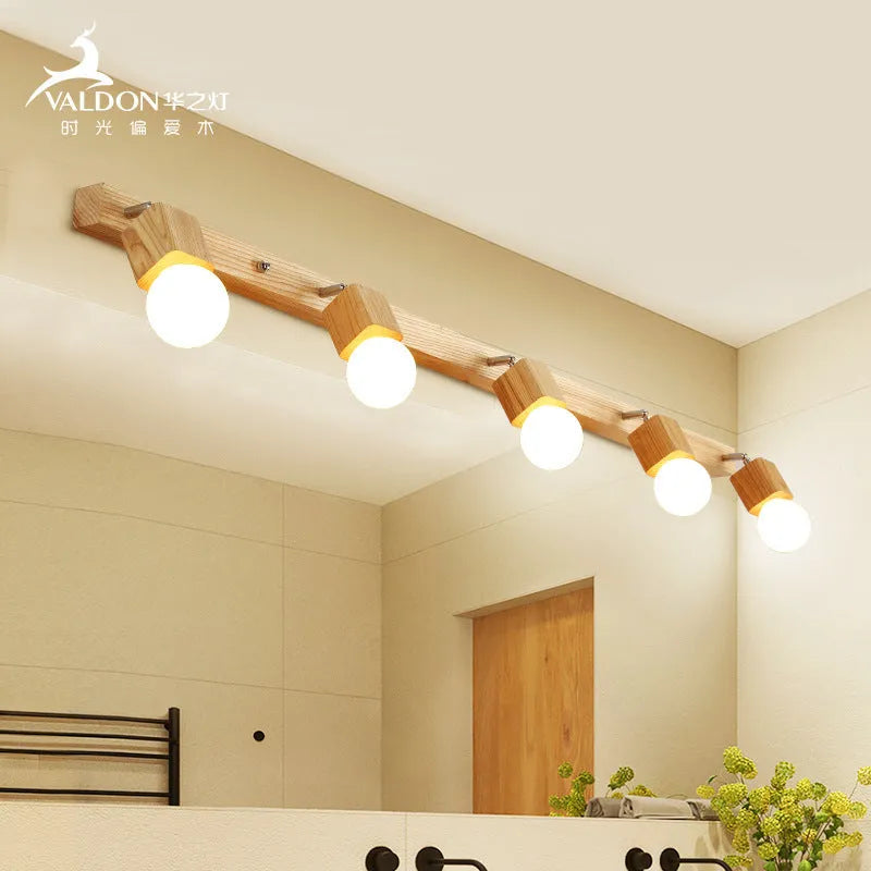 Single-headed 24cm wide LED mirror cabinet wall lamp mounted on a wall