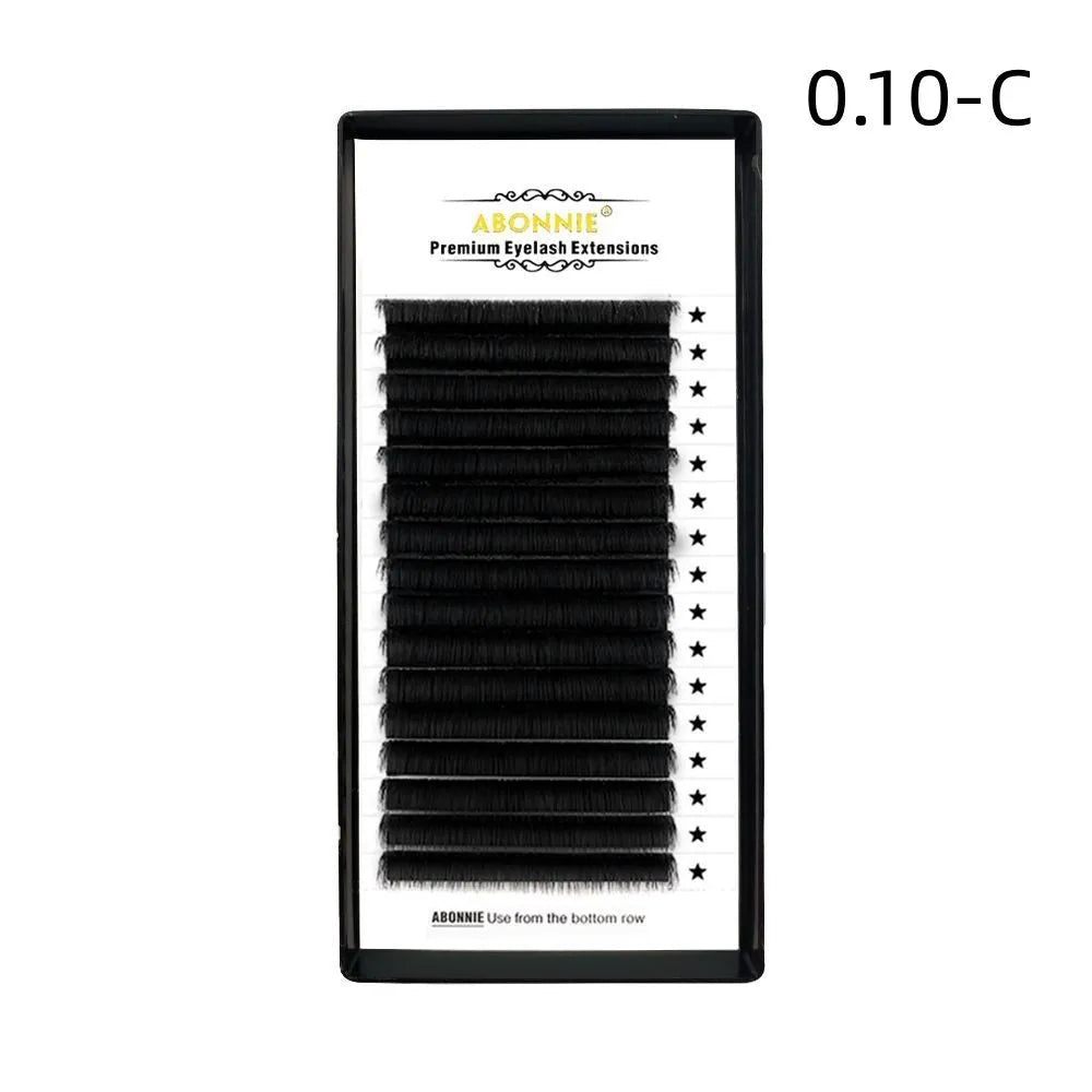 Dense 16-row false eyelashes made from mink hair in a matte round wool style on a clear strip.