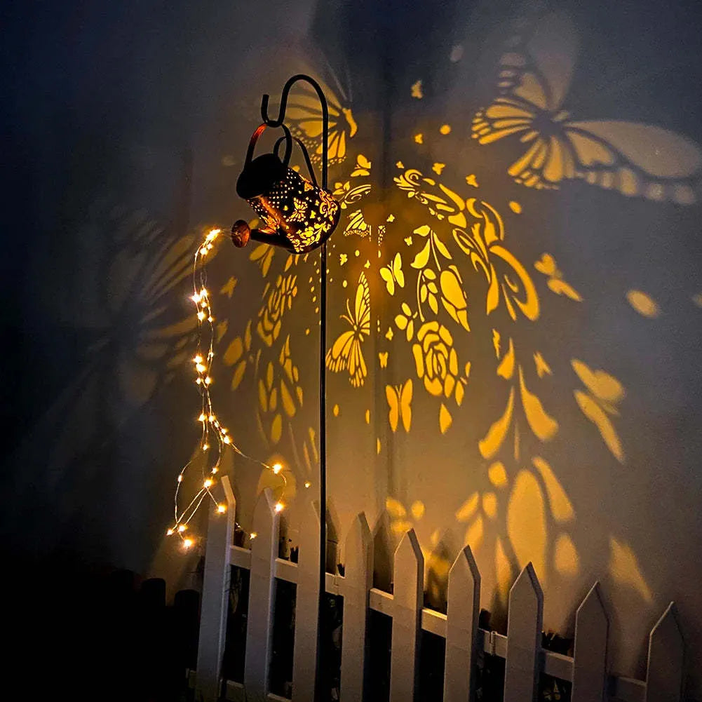 Solar garden lamp with tapered butterfly pattern design in iron construction