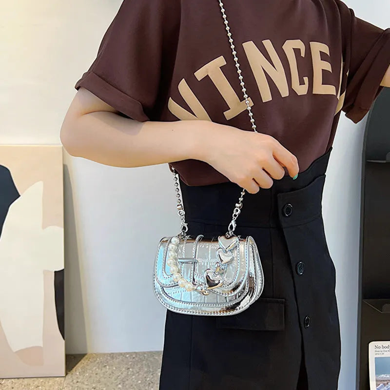 Women's laser pearl tote crossbody bag in silver colour with adjustable shoulder strap