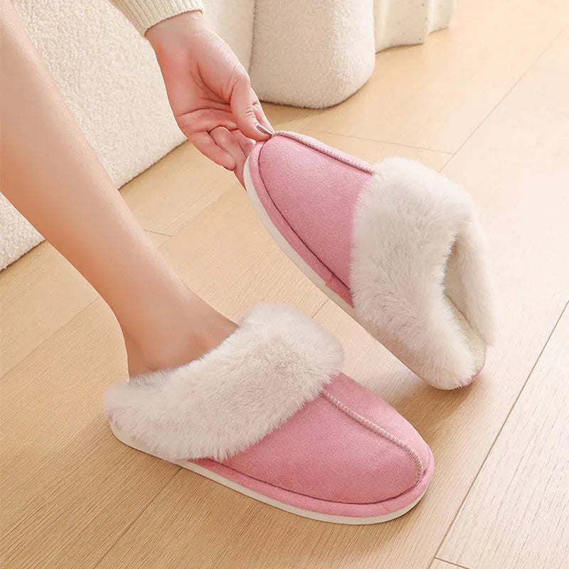 Women's brown plush indoor slippers with round toe, flat heel, and non-slip sole.