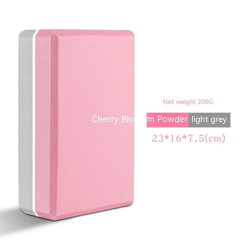EVA foam yoga block in violet colour, shown next to a pink block, demonstrating its size and rectangular shape for fitness support.