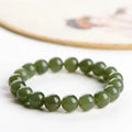 Hetian jade ball bracelet with spherical polished beads in clear colour tones